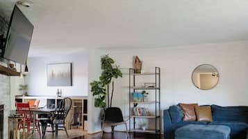 TV, fireplace, books, offices