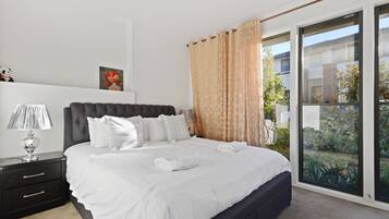 2 bedrooms, blackout curtains, iron/ironing board, free WiFi