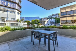 Apartment, 2 Bedrooms, Balcony, City View | Outdoor dining