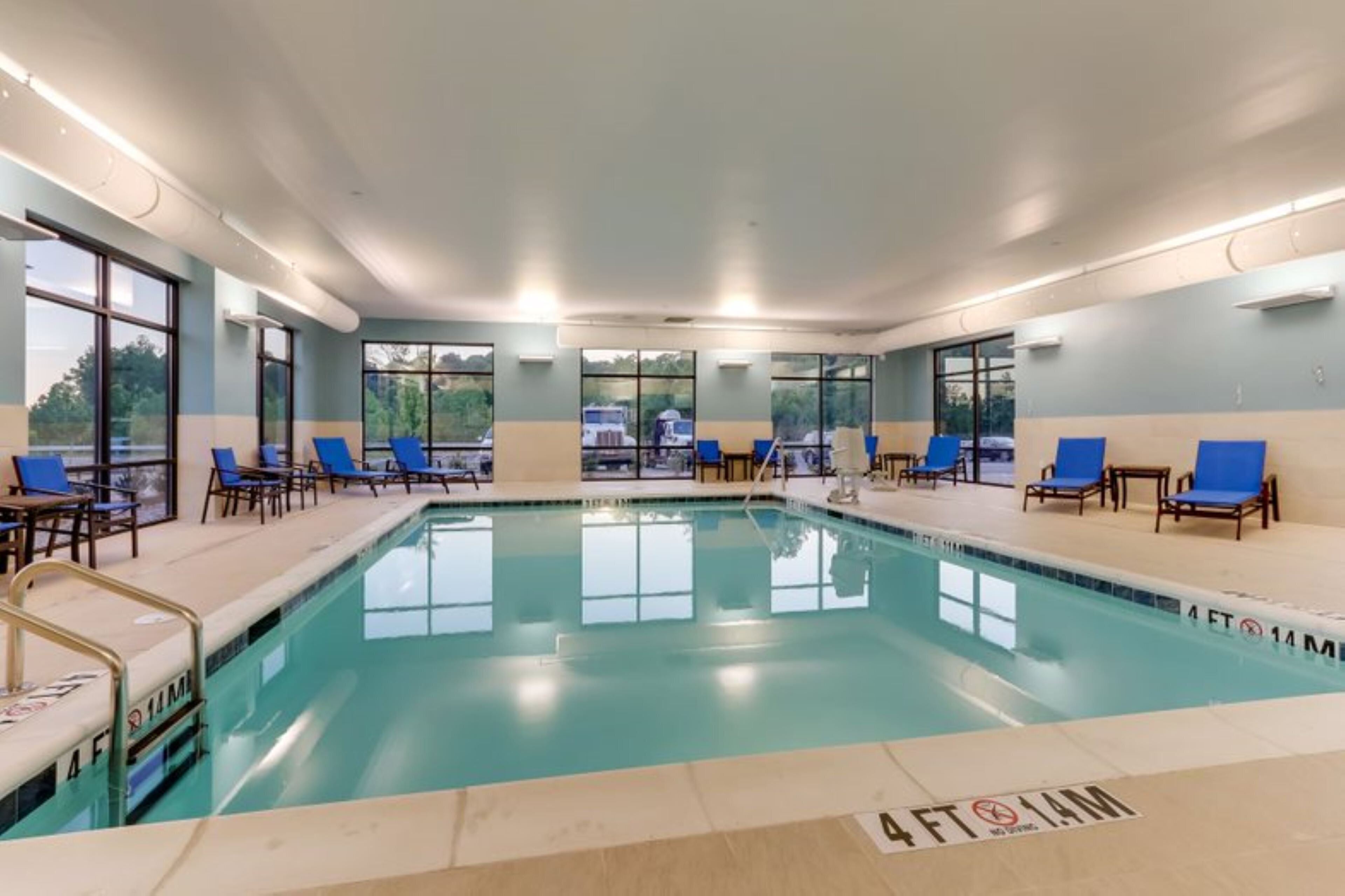 indoor pool, open 8:00 am to 10:00 pm, pool loungers