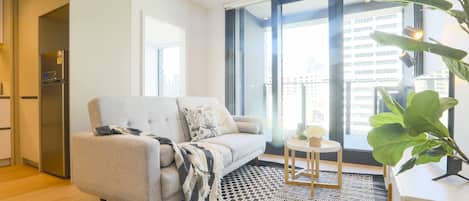 Apartemen Kota | Area keluarga | TV LCD