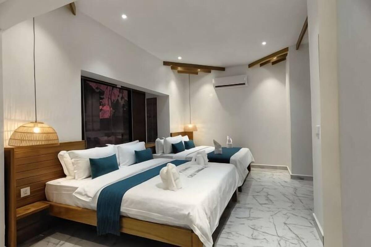 Ropa de cama de alta calidad y minibar