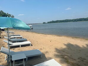 Beach nearby, sun loungers
