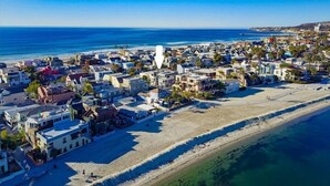 An aerial view of a coastal town with buildings, a beach, and the ocean. - Cape-Cod House * 3 Levels+Sky Deck * Beach+Bay Views * Dog OK (San Diego)
