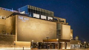 A modern hotel with a prominent sign reading "THE MAY HOTEL" and a large glass facade. - Jeonju The May Hotel (Jeonju)