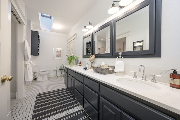 Combined shower/tub, hair dryer, towels, soap