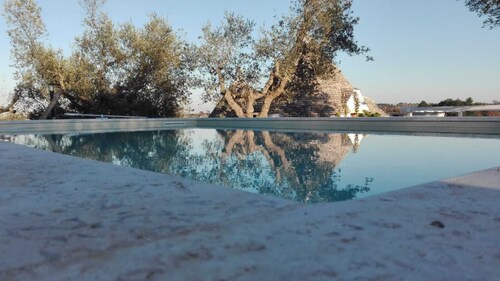 Trullo surrounded by nature with a beautiful view a stone's throw from the center