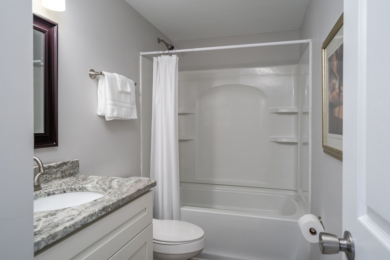 Combined shower/tub, hair dryer, towels, soap