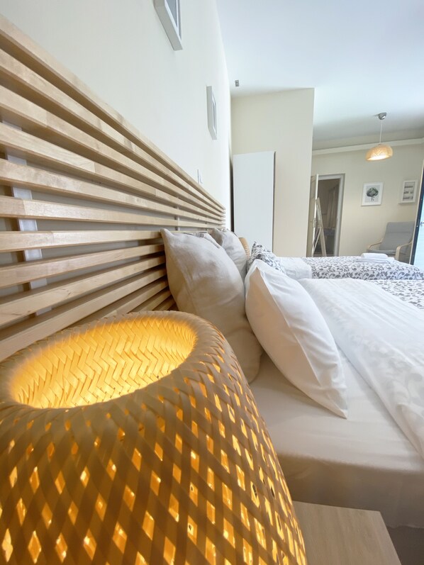 Habitación triple Deluxe | Tabla de planchar con plancha, cunas gratuitas, wifi gratis