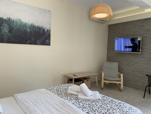 Kahden hengen deluxe-huone (yksi tai kaksi sänkyä) | Silitysrauta/-lauta, ilmaiset vauvansängyt, ilmainen Wi-Fi