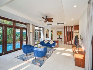 Executive-Villa, 4 Schlafzimmer, Gartenblick | Wohnbereich