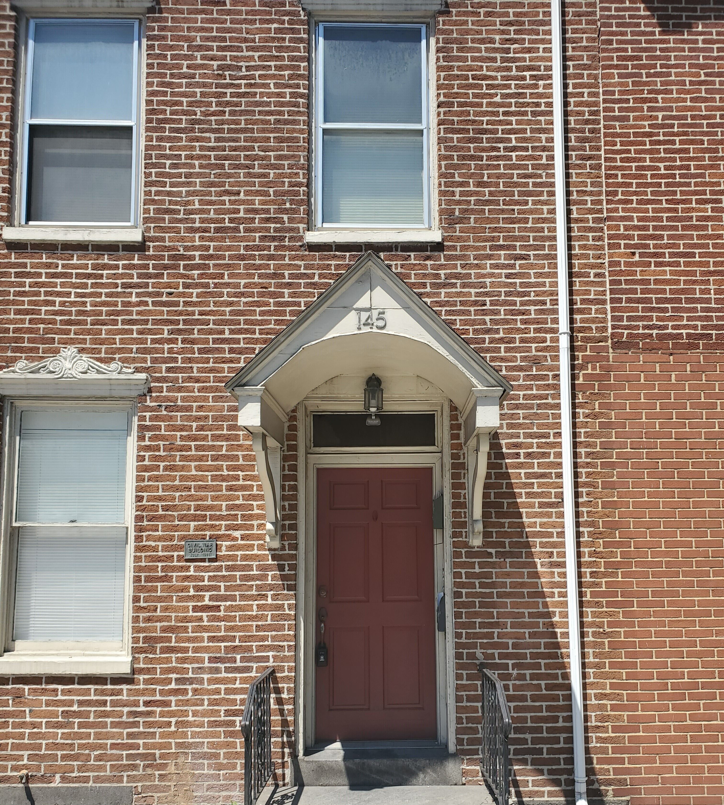 Downtown location w/ parking. Transit stop across the street. Unit 3 of 4.
