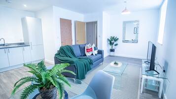 Grand Apartment, 1 Double Bed | Living area | TV