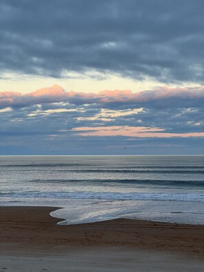 On the beach, sun-loungers