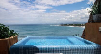 Beachfront, Laid Back Luxury Penthouse on Beautiful Manzanillo Bay Surf Break
