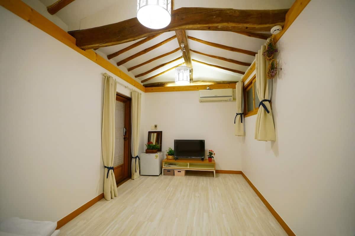 Traditional Room (Moon) | Premium bedding, individually decorated, individually furnished