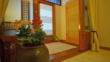 Traditional Room (Gold) | Premium bedding, individually decorated, individually furnished