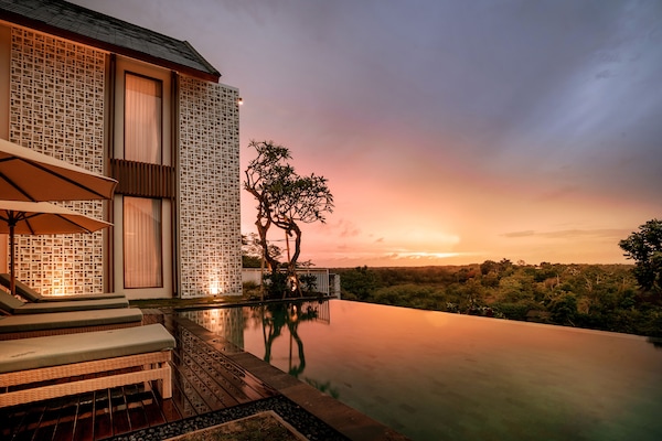 2 outdoor pools, pool umbrellas, sun loungers