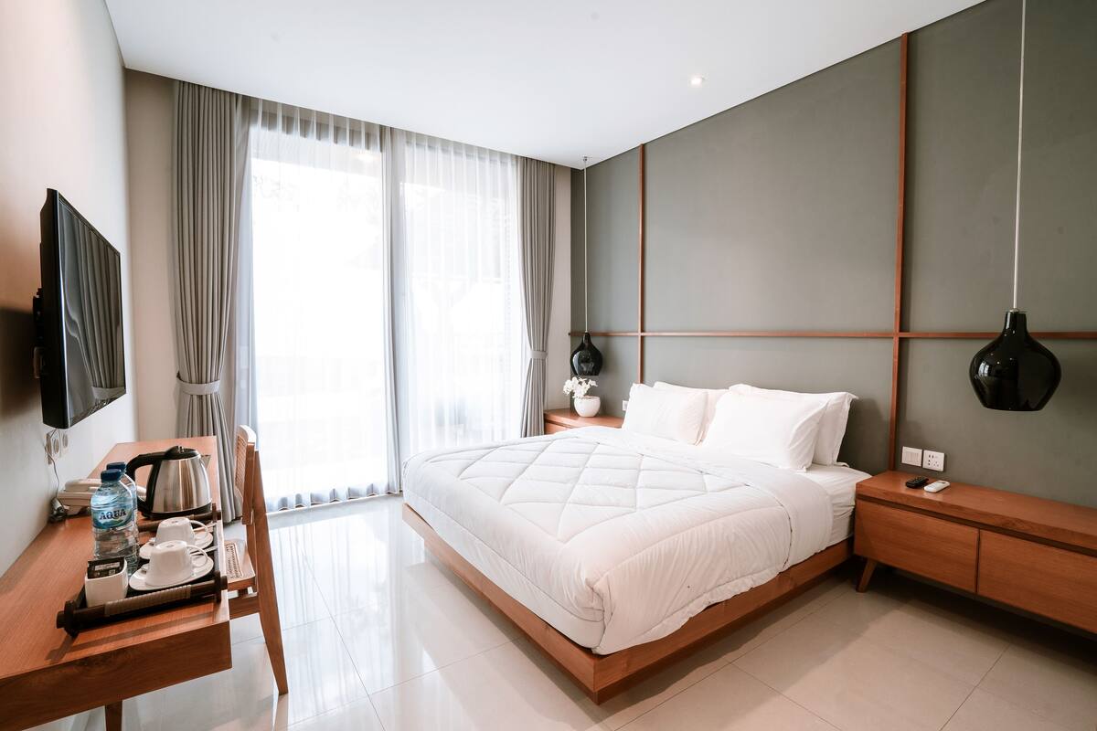 ห้องดีลักซ์ดับเบิล, วิวสระว่ายน้ำ | ผ้าม่านกันแสง, ห้องเก็บเสียง, Wi-Fi ฟรี, ผ้าปูที่นอน