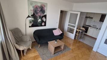 Apartment (Two-Bedroom Apartment with Balcony an) | Living room | TV