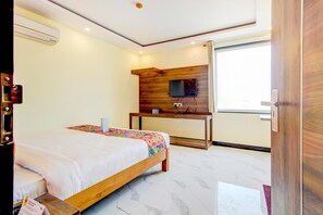 Quartos à prova de som, Wi-Fi de cortesia, roupa de cama