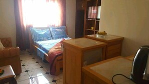 1 chambre, fer et planche Ă repasser, Wi-Fi, draps fournis