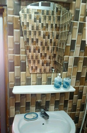 Douche, serviettes fournies