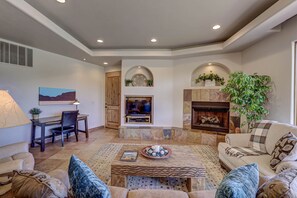 Smart TV, fireplace, DVD player, books