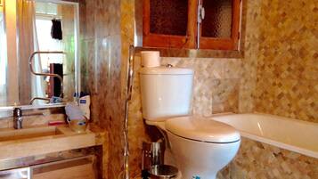 Bathtub, hair dryer, towels