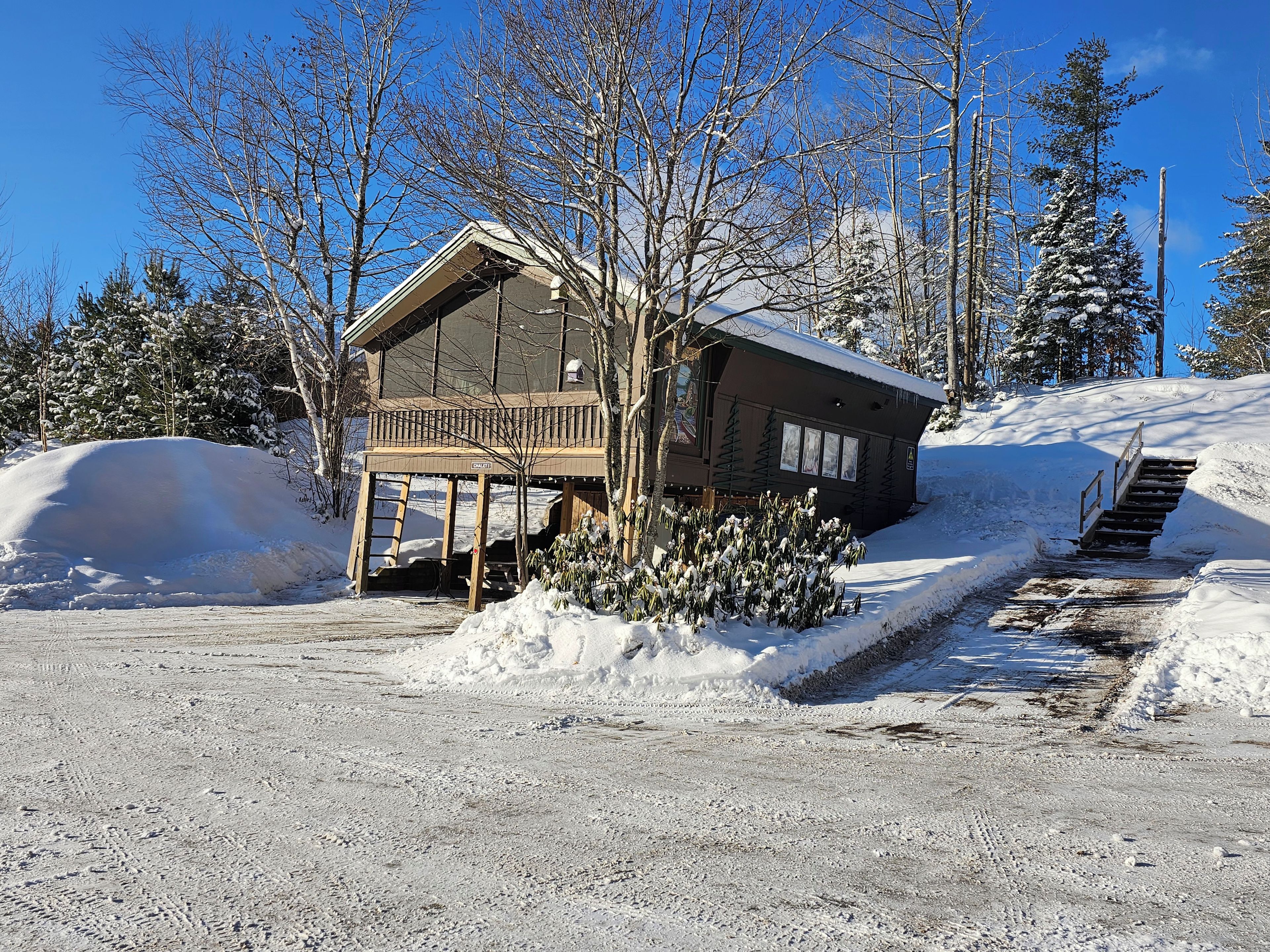 We have in house plowing and shoveling straight to the front door.