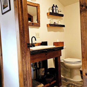 Combined shower/tub, hair dryer, towels, soap