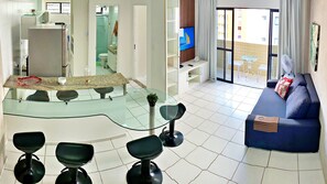 Quarto executivo | Área de estar | TV de tela plana