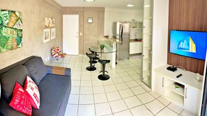 Quarto executivo | Área de estar | TV de tela plana