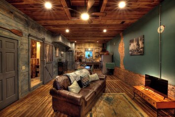 The Chattooga Room's design is inspired by scenes from the local Chattooga River that runs through Oconee County. You can find scenes and memorabilia from a real, local family homestead in the decor. 