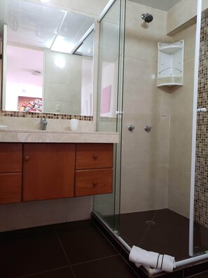 Shower, hair dryer, towels, soap
