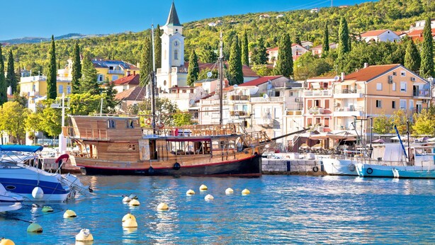 A harbor with boats, a church, and residential buildings. - Villa Leca Pool and Sauna (Vinodol)