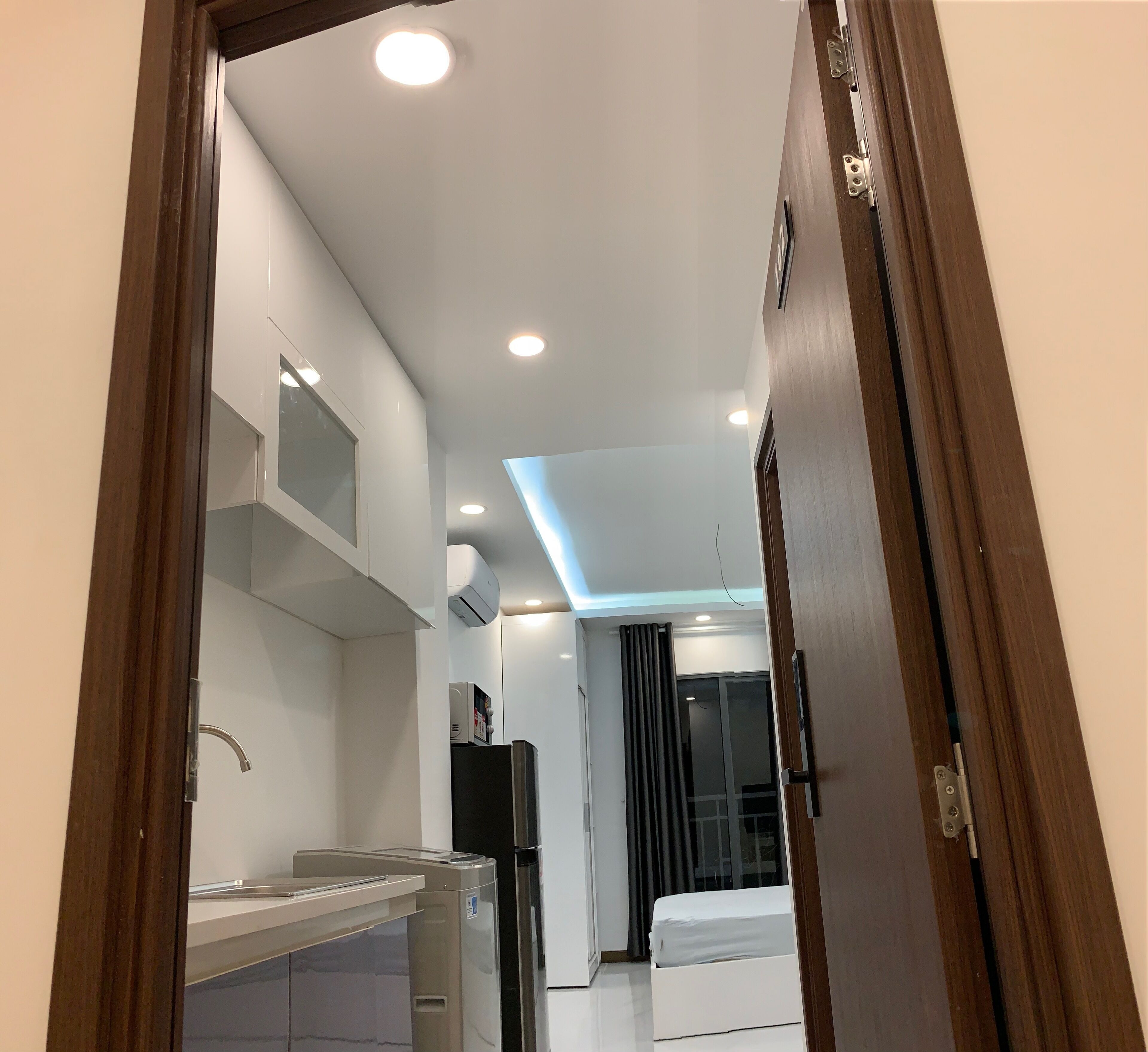 Deluxe Studio Suite | Private kitchen | Electric kettle, cleaning supplies