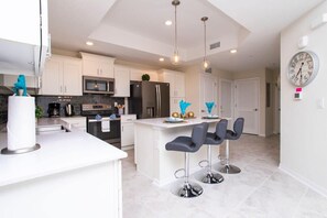 Fridge, microwave, oven, stovetop - Luxurious 3Bd Storey Lake Resort Near Disney 3131 (Kissimmee)