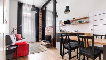 Superior Apartment | Living room | Flat-screen TV
