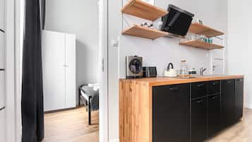 Appartement Supérieur | Coin cuisine privé | Grand réfrigérateur, plaque de cuisson, lave-vaisselle