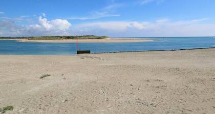 "Charming Seaside Home with Modern Amenities & Private Garden in Port-Bail-sur-Mer"