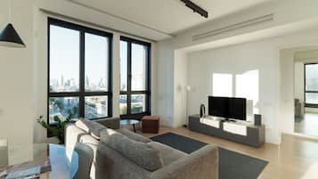 Superior-Apartment | Wohnbereich | 40-Zoll-Flachbildfernseher mit Satellitenempfang, Fernseher