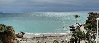 Stunning views, centrally located modern apartment. Air con, Pool, WiFi and Sky.