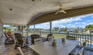 Outdoor dining - Eight Bedroom, Eight and a half bathrooms, Channel Front Home, Private Pool (Garden City Beach)