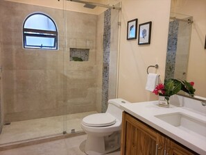 Shower, hair dryer, towels, soap