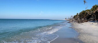 Steps from the beach! Spacious island retreat with pool, grill, and space for 12