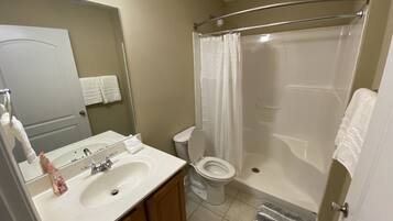 Shower, towels, toilet paper