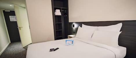 Premium bedding, individually furnished, desk, laptop workspace