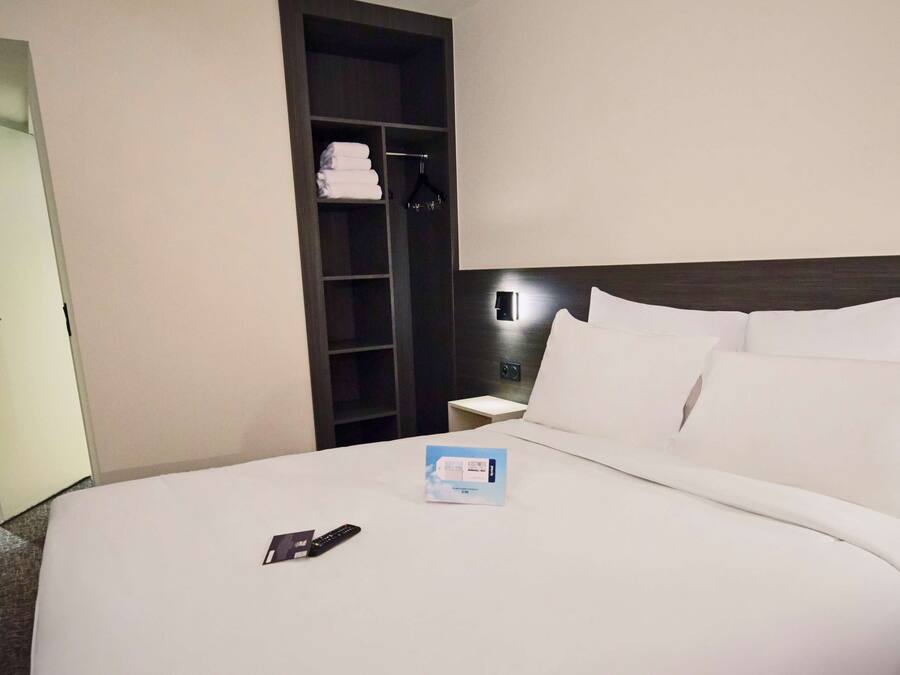 Premium bedding, individually furnished, desk, laptop workspace