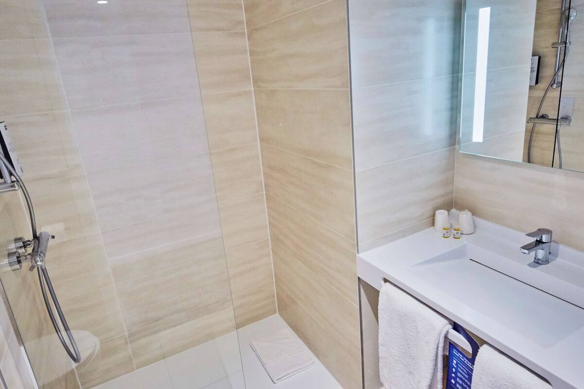 shower, eco-friendly toiletries, hair dryer, soap